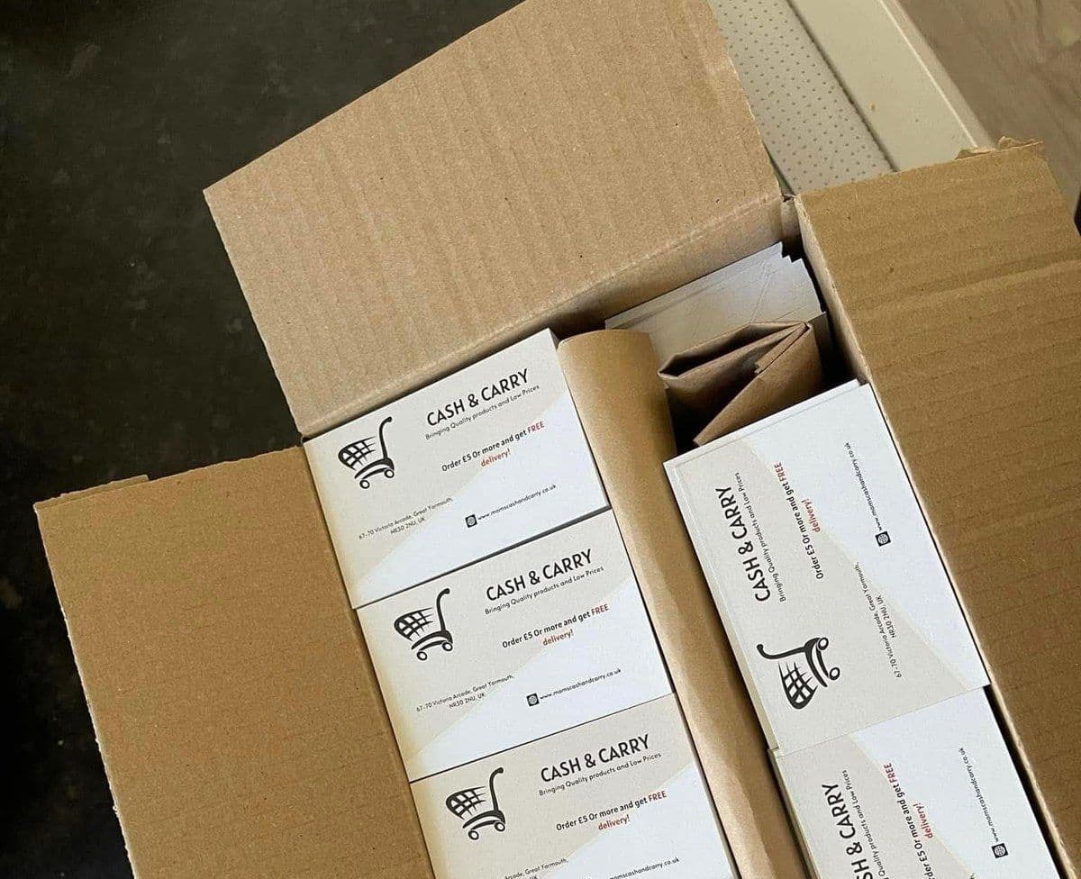 Printed business cards for Mom's Cash & Carry, Great Yarmouth - designed and sent to print.